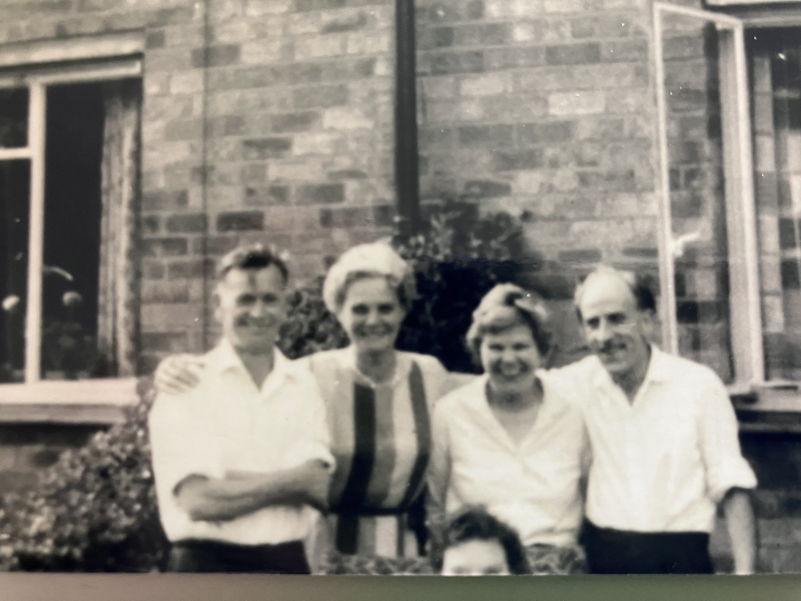 Vintage family photo pre restoration, colourisation and editing