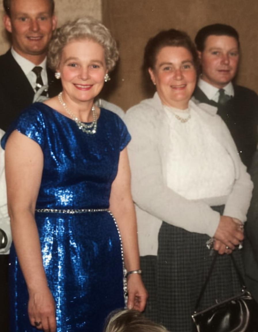 Vintage photograph of two women after restoration and colourisation